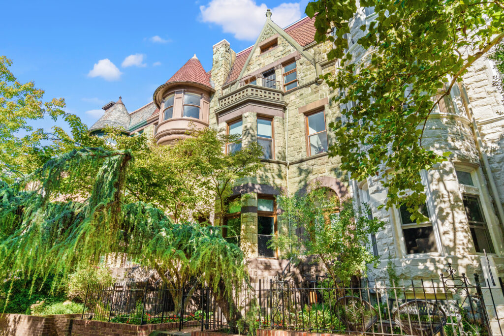 Luxury penthouse in Dupont Circle featuring historic architecture, lush greenery, and private roof deck.